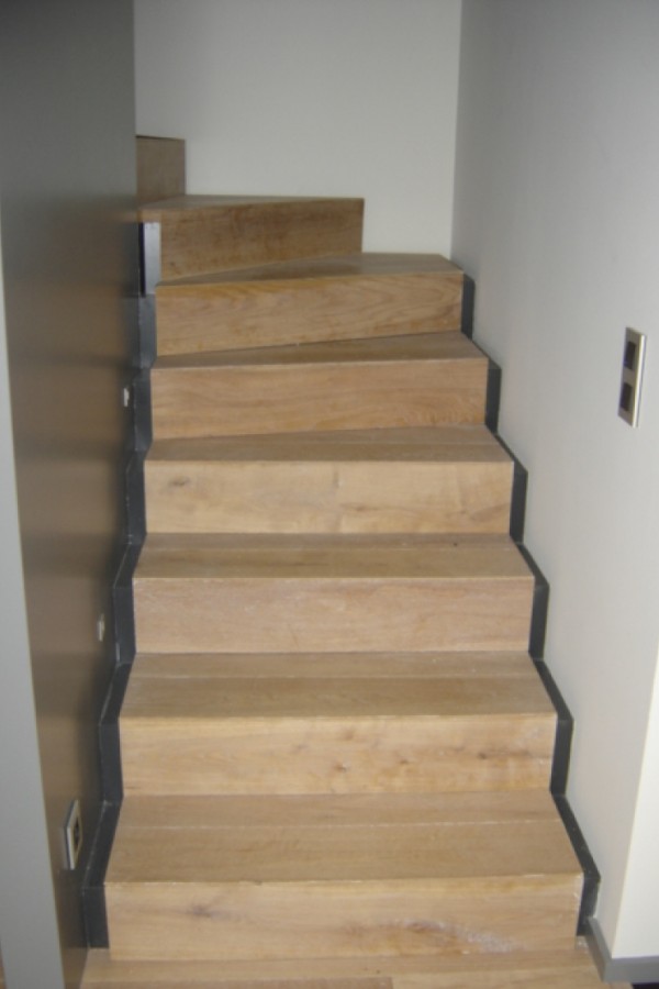 Fabrication et pose d'escaliers et garde